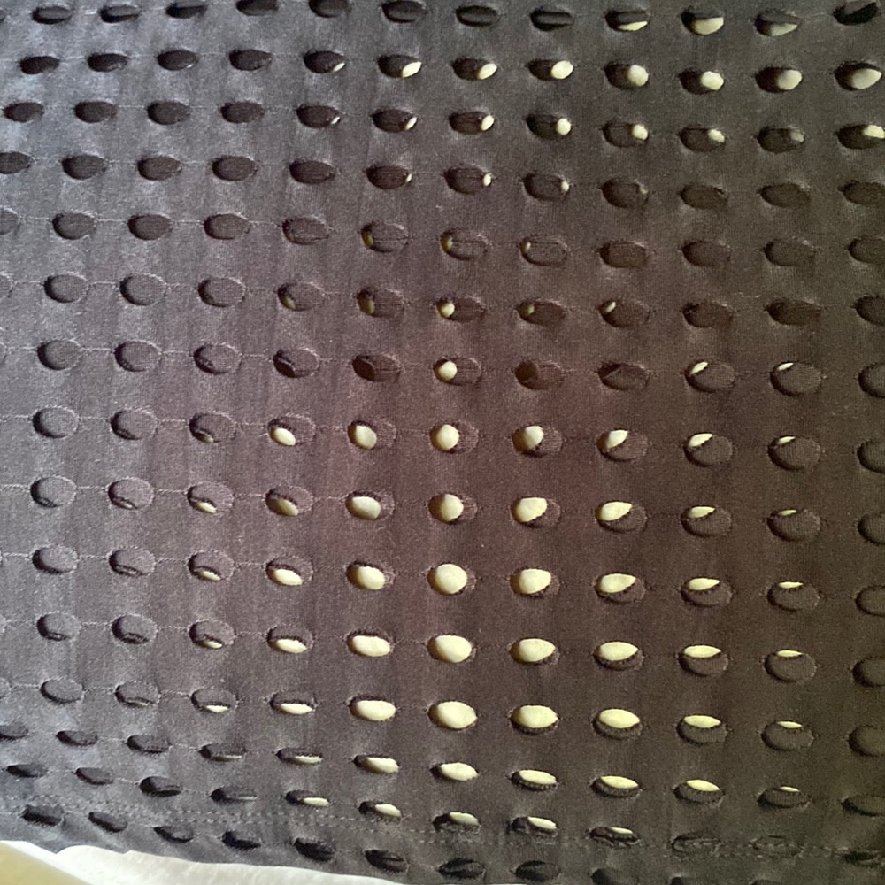 Black pull on skirt with hole punch design